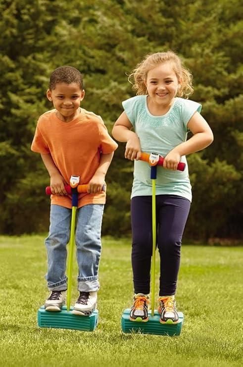 two kids playing on pogo sticks